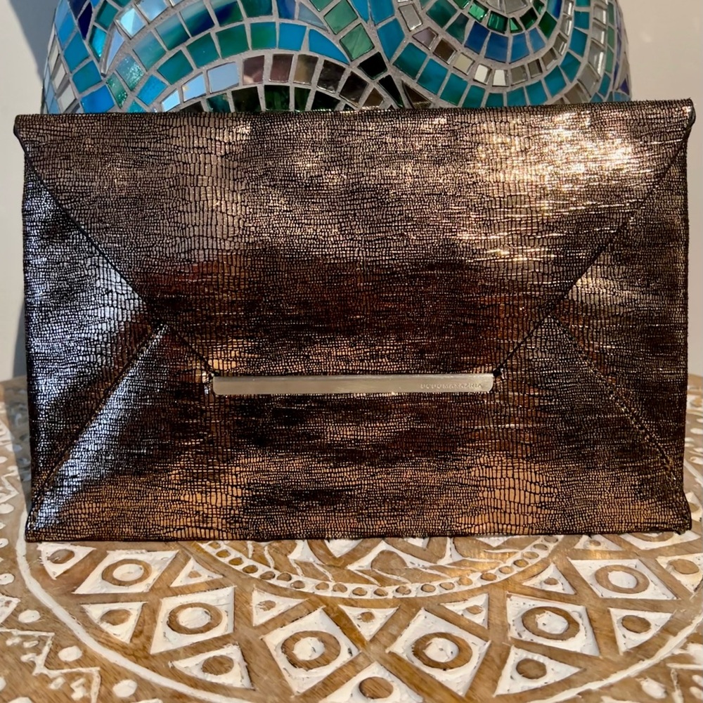 BCBGMaxAzria rose gold envelope clutch
